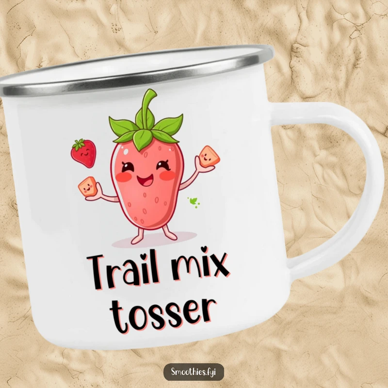 Funny enamel camping mug featuring a smiling anthropomorphic strawberry smoothie juggling fruit, ideal for cheerful campfire moments.