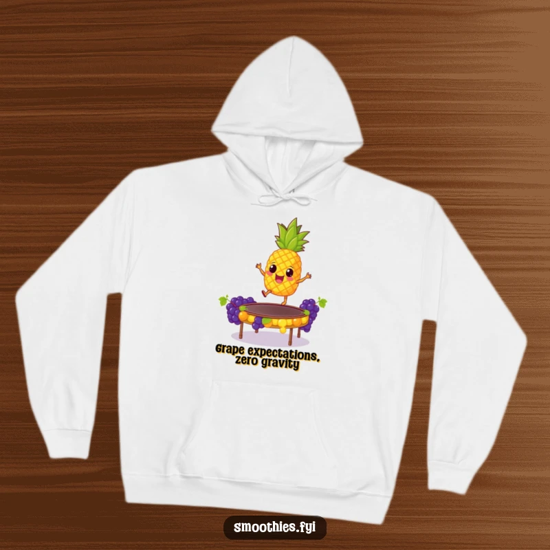 Funny Hoodie: A deliriously happy pineapple is captured mid-air, jumping on a trampoline made of grapes, radiating pure, unadulterated silliness and glee.