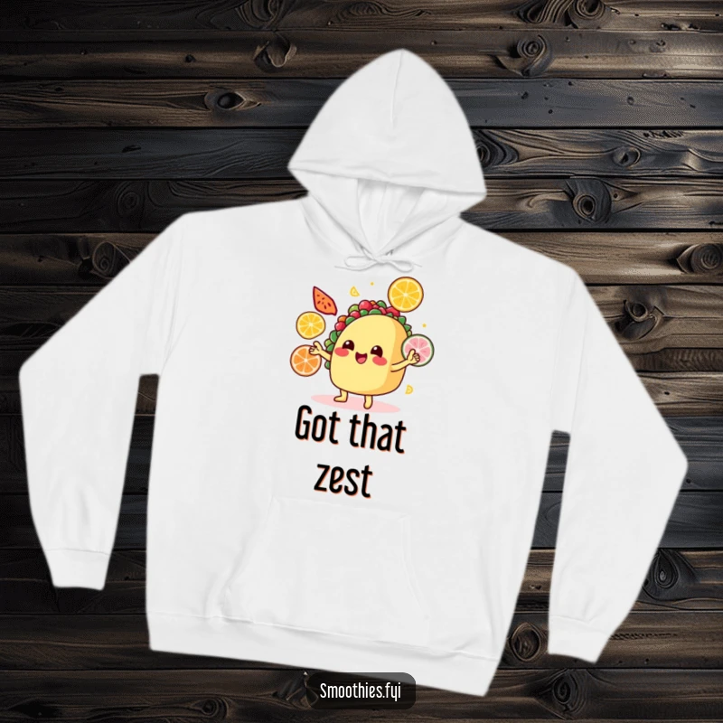 Funny Hoodie: A smiling taco juggles various colorful fruit slices, presented on a cozy, fun, and humorous garment.