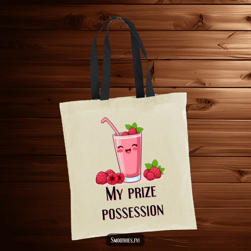 Funny raspberry smoothie tote bag with a contented character raising a glass, perfect for carrying items.